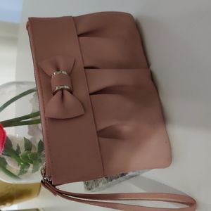 Light rose pink wrist handbag